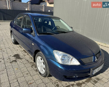 Синій Міцубісі Lancer, об'ємом двигуна 1.6 л та пробігом 148 тис. км за 3000 $, фото 1 на Automoto.ua