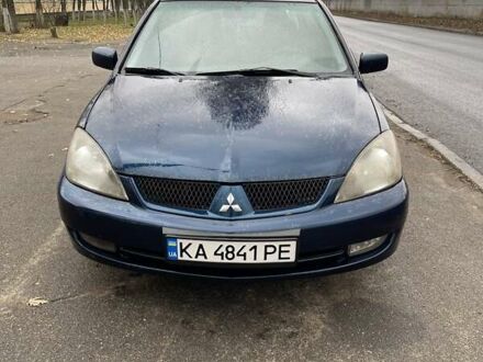 Синій Міцубісі Lancer, об'ємом двигуна 2 л та пробігом 430 тис. км за 4200 $, фото 1 на Automoto.ua