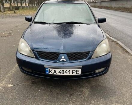 Синій Міцубісі Lancer, об'ємом двигуна 2 л та пробігом 430 тис. км за 4200 $, фото 1 на Automoto.ua