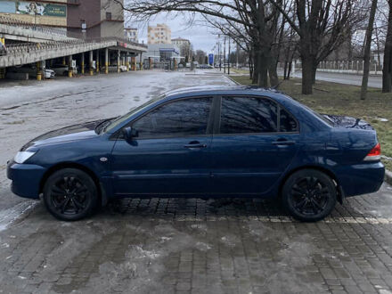 Міцубісі Lancer 2006 у Харкові на Automoto.ua Синій Міцубісі Lancer, об'ємом двигуна 1.6 л та пробігом 270 тис. км за 5000 $, фото 1 на Automoto.ua