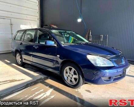 Синий Мицубиси Лансер, объемом двигателя 1.6 л и пробегом 25000 тыс. км за 3900 $, фото 1 на Automoto.ua