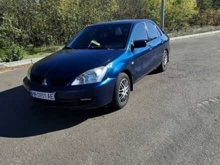 Синій Міцубісі Lancer, об'ємом двигуна 1.6 л та пробігом 267 тис. км за 3700 $, фото 1 на Automoto.ua