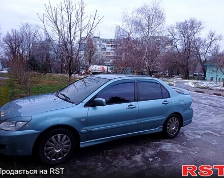 Синий Мицубиси Лансер, объемом двигателя 1.6 л и пробегом 23500 тыс. км за 4600 $, фото 1 на Automoto.ua