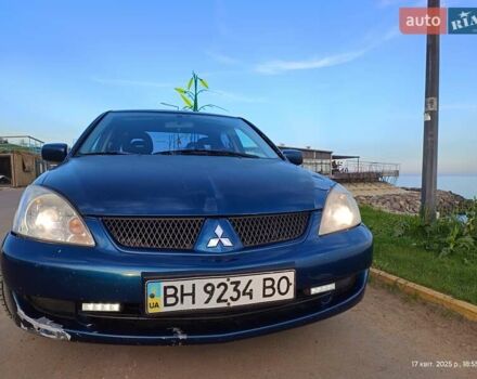 Синій Міцубісі Lancer, об'ємом двигуна 1.58 л та пробігом 194 тис. км за 3700 $, фото 1 на Automoto.ua