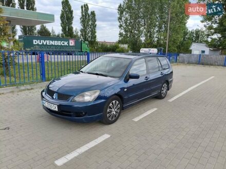 Синій Міцубісі Lancer, об'ємом двигуна 1.6 л та пробігом 258 тис. км за 4300 $, фото 1 на Automoto.ua