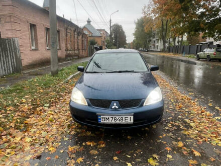 Мицубиси Лансер 2006 в Сумах на Automoto.ua Синий Мицубиси Лансер, объемом двигателя 1.58 л и пробегом 179 тыс. км за 3800 $, фото 1 на Automoto.ua