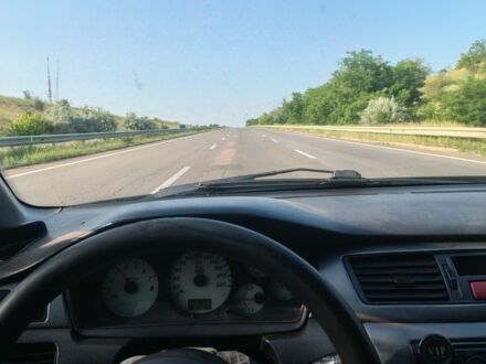 Мицубиси Лансер 2006 в Николаеве на Automoto.ua Синий Мицубиси Лансер, объемом двигателя 1.6 л и пробегом 370 тыс. км за 3400 $, фото 1 на Automoto.ua