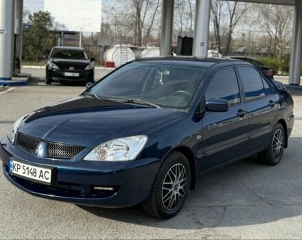 Синий Мицубиси Лансер, объемом двигателя 1.6 л и пробегом 270 тыс. км за 3600 $, фото 1 на Automoto.ua