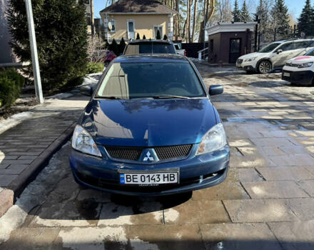 Синий Мицубиси Лансер, объемом двигателя 1.6 л и пробегом 240 тыс. км за 3000 $, фото 1 на Automoto.ua