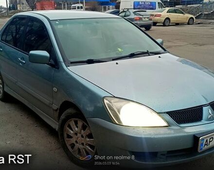 Синий Мицубиси Лансер, объемом двигателя 1.6 л и пробегом 24700 тыс. км за 3400 $, фото 1 на Automoto.ua