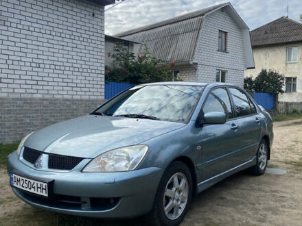 Синій Міцубісі Lancer, об'ємом двигуна 1.58 л та пробігом 230 тис. км за 4900 $, фото 1 на Automoto.ua