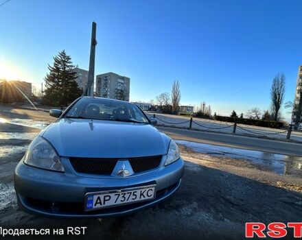 Синий Мицубиси Лансер, объемом двигателя 1.6 л и пробегом 277 тыс. км за 3300 $, фото 1 на Automoto.ua