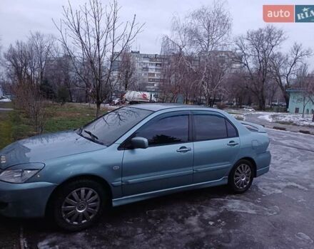 Синій Міцубісі Lancer, об'ємом двигуна 1.6 л та пробігом 230 тис. км за 4600 $, фото 1 на Automoto.ua