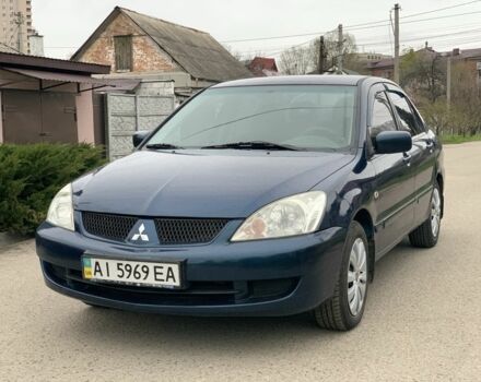 Синий Мицубиси Лансер, объемом двигателя 1.6 л и пробегом 179 тыс. км за 3999 $, фото 1 на Automoto.ua