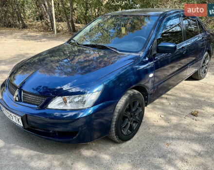 Синій Міцубісі Lancer, об'ємом двигуна 1.58 л та пробігом 208 тис. км за 4000 $, фото 1 на Automoto.ua