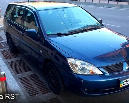 Синій Міцубісі Lancer, об'ємом двигуна 1.6 л та пробігом 245 тис. км за 3299 $, фото 1 на Automoto.ua