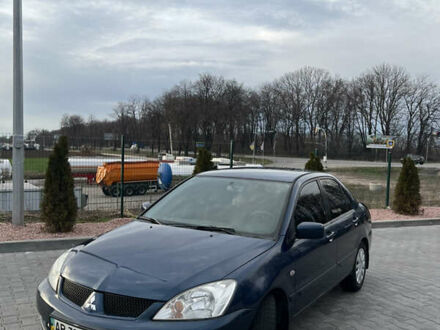 Міцубісі Lancer 2006 у Вінниці на Automoto.ua Синій Міцубісі Lancer, об'ємом двигуна 1.6 л та пробігом 267 тис. км за 3999 $, фото 1 на Automoto.ua