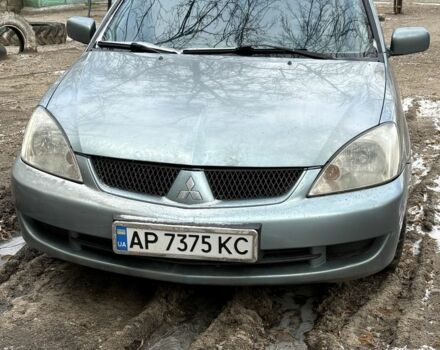 Синий Мицубиси Лансер, объемом двигателя 1.6 л и пробегом 275 тыс. км за 3700 $, фото 1 на Automoto.ua