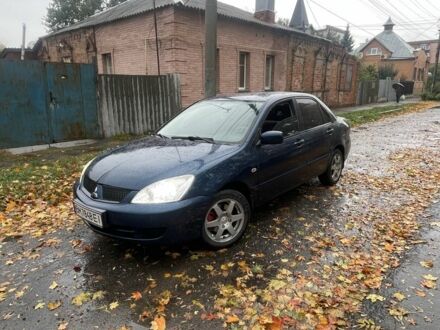 Мицубиси Лансер 2006 в Сумах на Automoto.ua Синий Мицубиси Лансер, объемом двигателя 1.6 л и пробегом 179 тыс. км за 3800 $, фото 1 на Automoto.ua