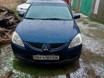 Синій Міцубісі Lancer, об'ємом двигуна 1.6 л та пробігом 369 тис. км за 2700 $, фото 1 на Automoto.ua