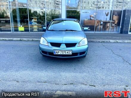 Синий Мицубиси Лансер, объемом двигателя 1.6 л и пробегом 273 тыс. км за 3499 $, фото 1 на Automoto.ua