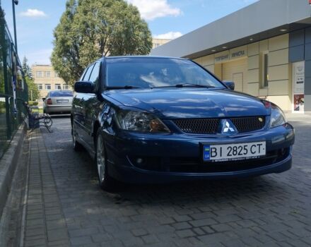 Синий Мицубиси Лансер, объемом двигателя 1.6 л и пробегом 242 тыс. км за 5500 $, фото 1 на Automoto.ua