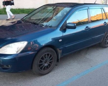 Синій Міцубісі Lancer, об'ємом двигуна 1.6 л та пробігом 245 тис. км за 3299 $, фото 1 на Automoto.ua