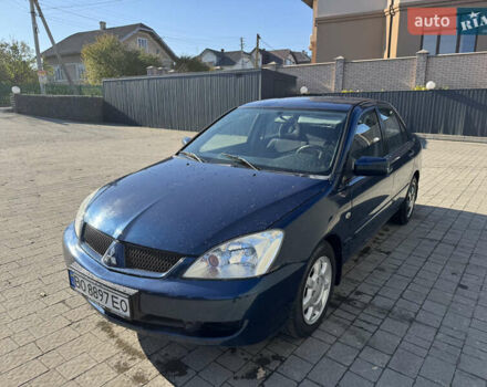 Синій Міцубісі Lancer, об'ємом двигуна 1.6 л та пробігом 148 тис. км за 3800 $, фото 1 на Automoto.ua
