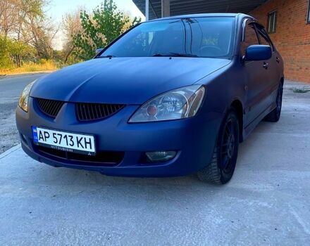 Синий Мицубиси Лансер, объемом двигателя 2 л и пробегом 0 тыс. км за 4799 $, фото 1 на Automoto.ua