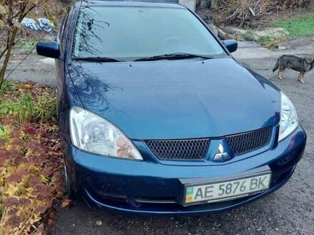 Синій Міцубісі Lancer, об'ємом двигуна 1.6 л та пробігом 87 тис. км за 6800 $, фото 1 на Automoto.ua
