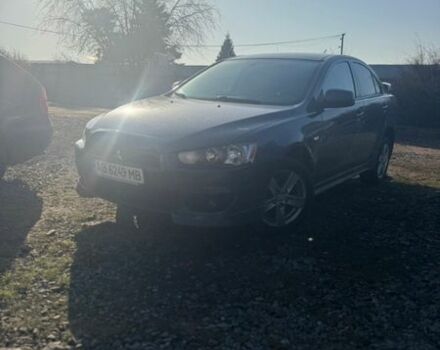 Синий Мицубиси Лансер, объемом двигателя 2 л и пробегом 187 тыс. км за 5100 $, фото 1 на Automoto.ua