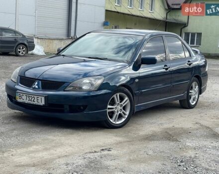 Синий Мицубиси Лансер, объемом двигателя 2 л и пробегом 217 тыс. км за 4100 $, фото 1 на Automoto.ua