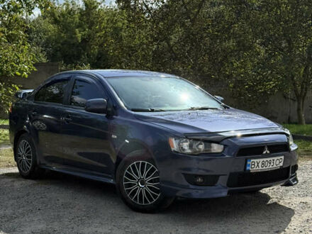 Синій Міцубісі Lancer, об'ємом двигуна 1.5 л та пробігом 150 тис. км за 6599 $, фото 1 на Automoto.ua
