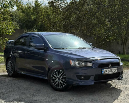 Синій Міцубісі Lancer, об'ємом двигуна 1.5 л та пробігом 150 тис. км за 6599 $, фото 1 на Automoto.ua