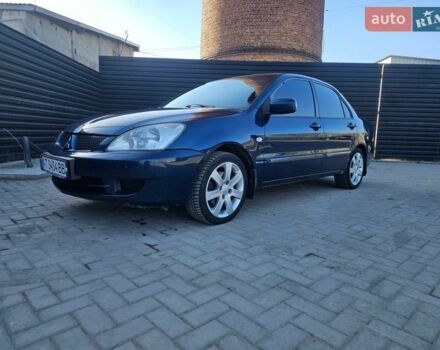 Синий Мицубиси Лансер, объемом двигателя 1.59 л и пробегом 307 тыс. км за 2700 $, фото 1 на Automoto.ua