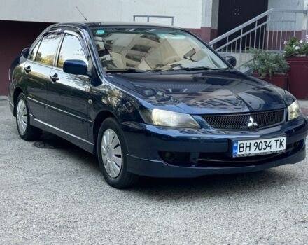 Синій Міцубісі Lancer, об'ємом двигуна 2 л та пробігом 237 тис. км за 4350 $, фото 1 на Automoto.ua
