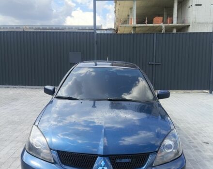 Синій Міцубісі Lancer, об'ємом двигуна 2 л та пробігом 330 тис. км за 4200 $, фото 1 на Automoto.ua
