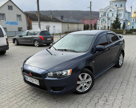 Синій Міцубісі Lancer, об'ємом двигуна 2 л та пробігом 326 тис. км за 5650 $, фото 1 на Automoto.ua