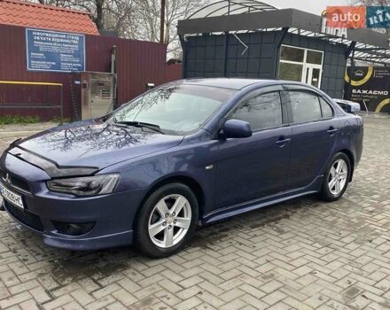 Синій Міцубісі Lancer, об'ємом двигуна 2 л та пробігом 210 тис. км за 6800 $, фото 1 на Automoto.ua