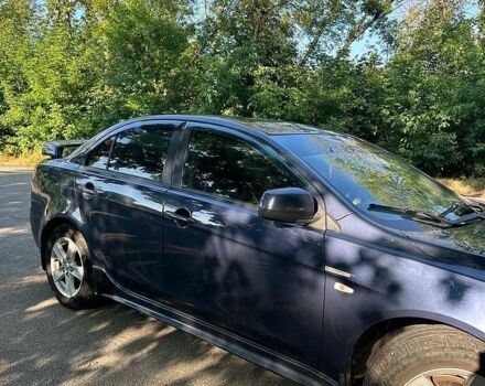 Синій Міцубісі Lancer, об'ємом двигуна 2 л та пробігом 313 тис. км за 5500 $, фото 1 на Automoto.ua
