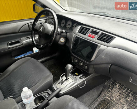 Синий Мицубиси Лансер, объемом двигателя 1.6 л и пробегом 360 тыс. км за 5000 $, фото 1 на Automoto.ua