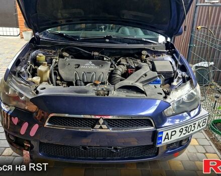Синій Міцубісі Lancer, об'ємом двигуна 2 л та пробігом 248 тис. км за 5000 $, фото 1 на Automoto.ua