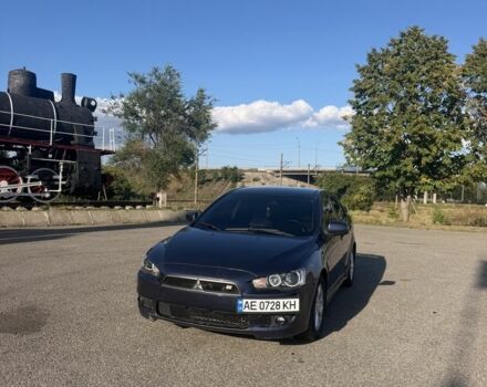 Синий Мицубиси Лансер, объемом двигателя 2 л и пробегом 240 тыс. км за 6198 $, фото 1 на Automoto.ua