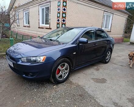 Синий Мицубиси Лансер, объемом двигателя 1.5 л и пробегом 211 тыс. км за 5222 $, фото 1 на Automoto.ua
