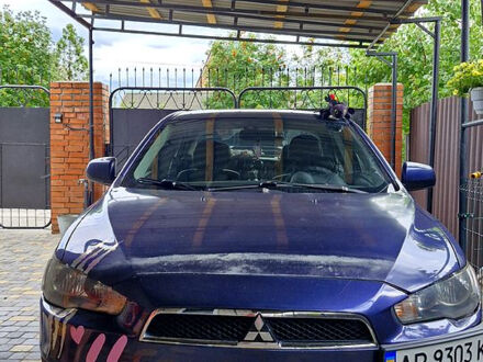 Мицубиси Лансер 2007 в Запорожье на Automoto.ua Синий Мицубиси Лансер, объемом двигателя 2 л и пробегом 245 тыс. км за 6300 $, фото 1 на Automoto.ua