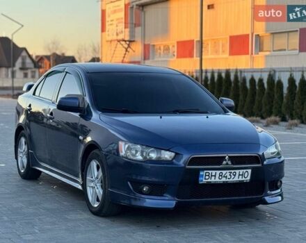 Синий Мицубиси Лансер, объемом двигателя 2 л и пробегом 230 тыс. км за 6400 $, фото 1 на Automoto.ua