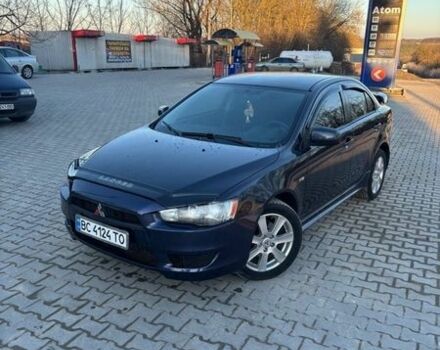 Синий Мицубиси Лансер, объемом двигателя 2 л и пробегом 330 тыс. км за 4850 $, фото 1 на Automoto.ua