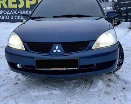 Синій Міцубісі Lancer, об'ємом двигуна 1.58 л та пробігом 233 тис. км за 4150 $, фото 1 на Automoto.ua