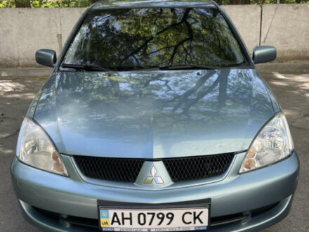 Синій Міцубісі Lancer, об'ємом двигуна 1.58 л та пробігом 210 тис. км за 5000 $, фото 1 на Automoto.ua
