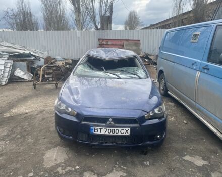 Синий Мицубиси Лансер, объемом двигателя 2 л и пробегом 240 тыс. км за 2000 $, фото 1 на Automoto.ua